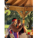 A man and woman dancing under the gazebo. 