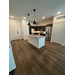  Long view of remodeled kitchen and front door at the grand opening of waterview crossing. 